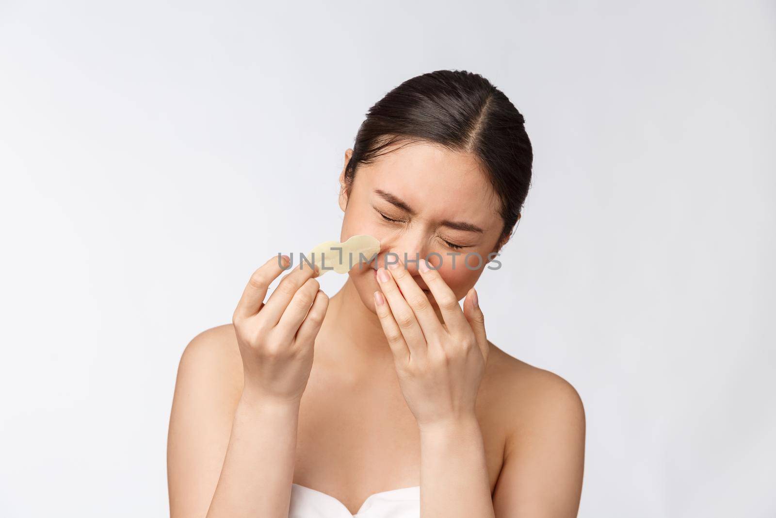 Cosmetology. Portrait Of Beautiful Female Asian Model With Mask On Nose. Closeup Of Healthy Young Woman With Pure Soft Skin And Fresh Natural Makeup