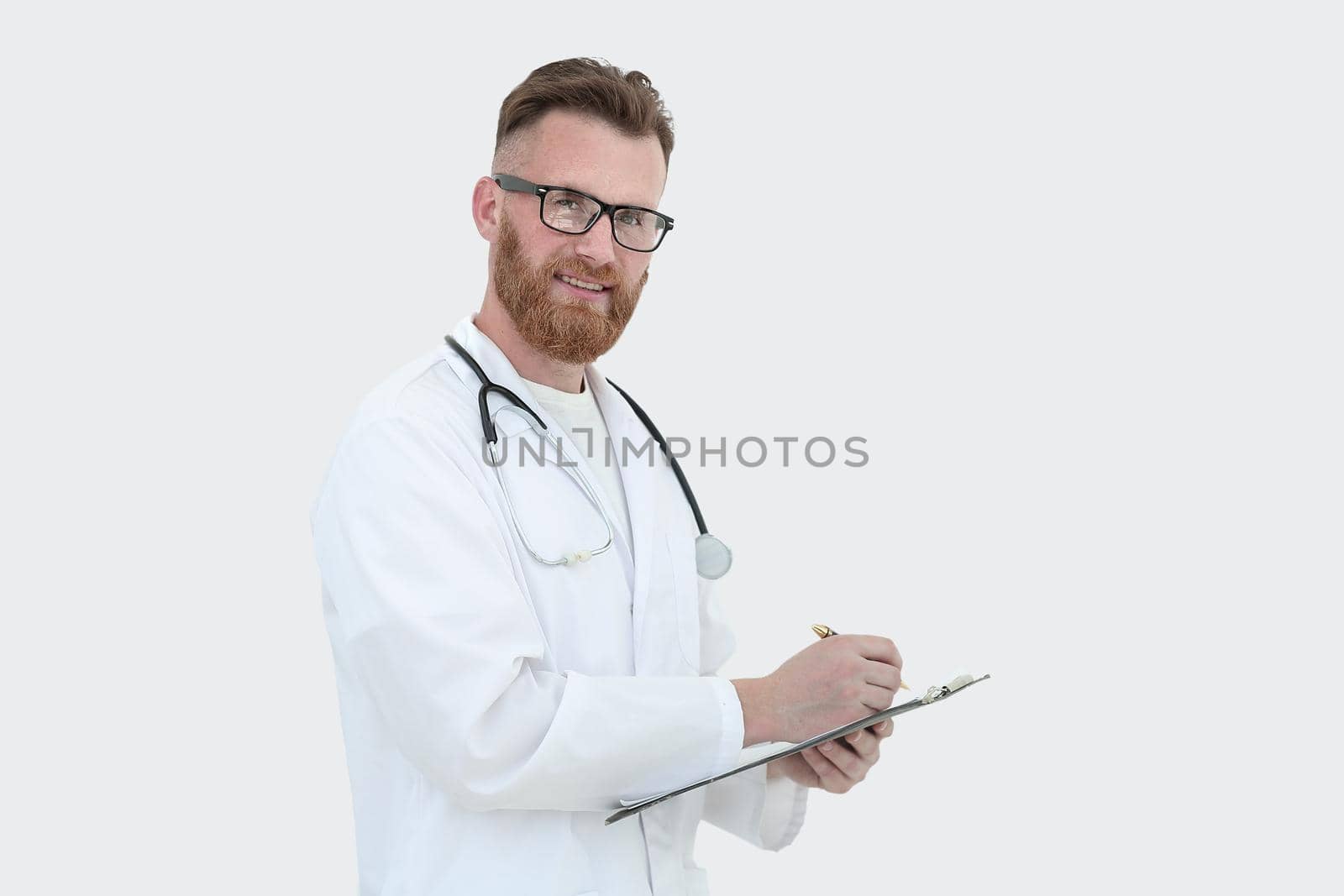 friendly doctor with clipboard. isolated on white background