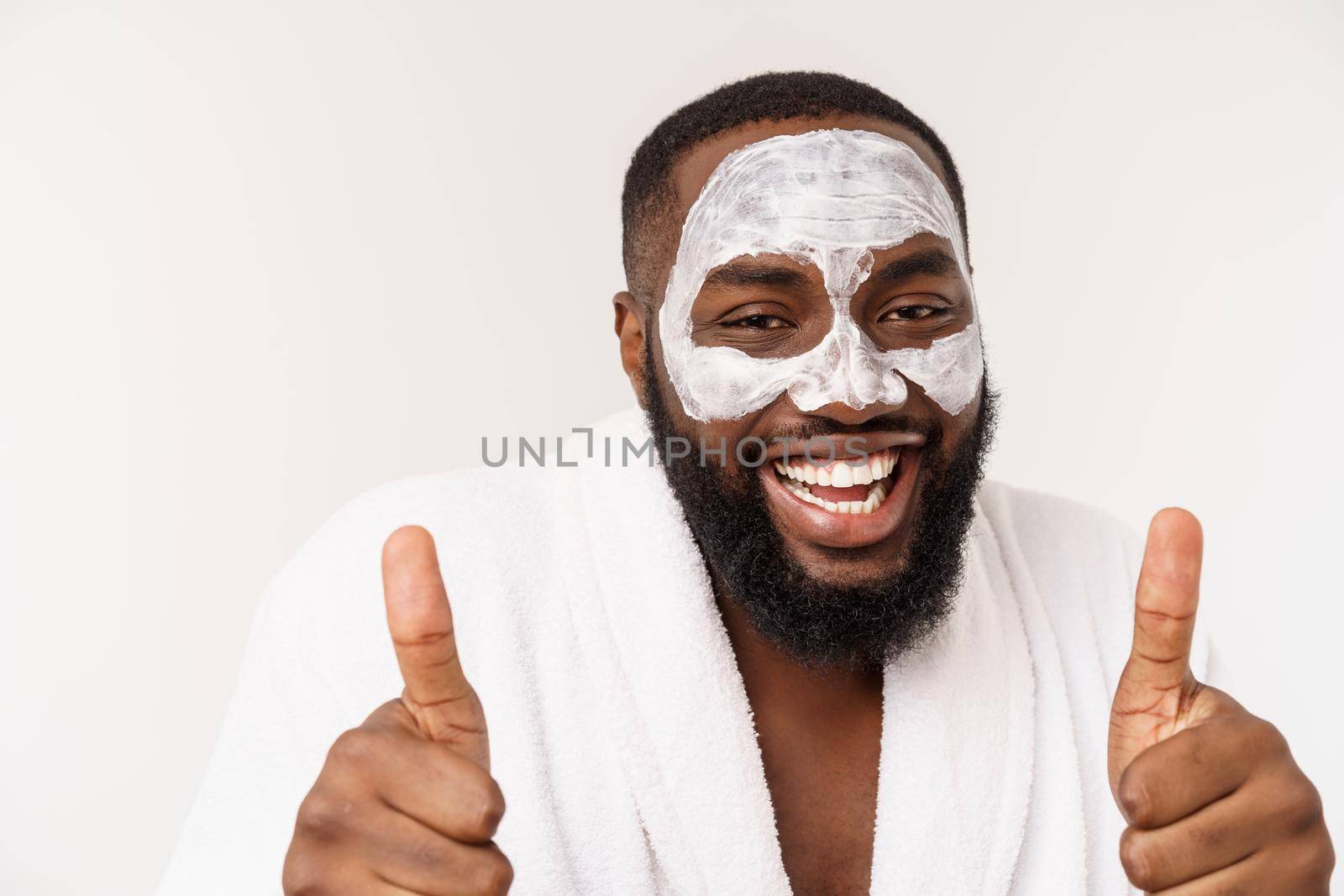 funny laughing man with mask leads healthy lifestyle, rejoicing at morning procedures. positive emotion in the morning