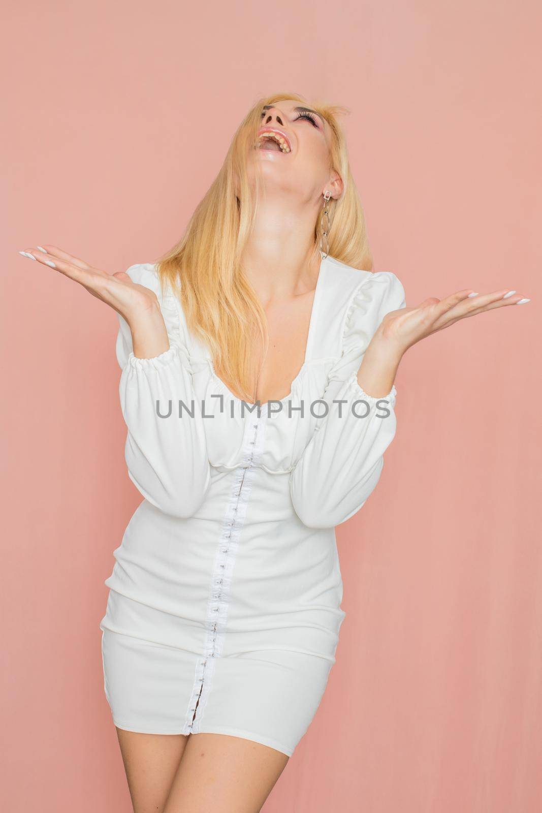 Woman in white dress with long sleeve by Bonda