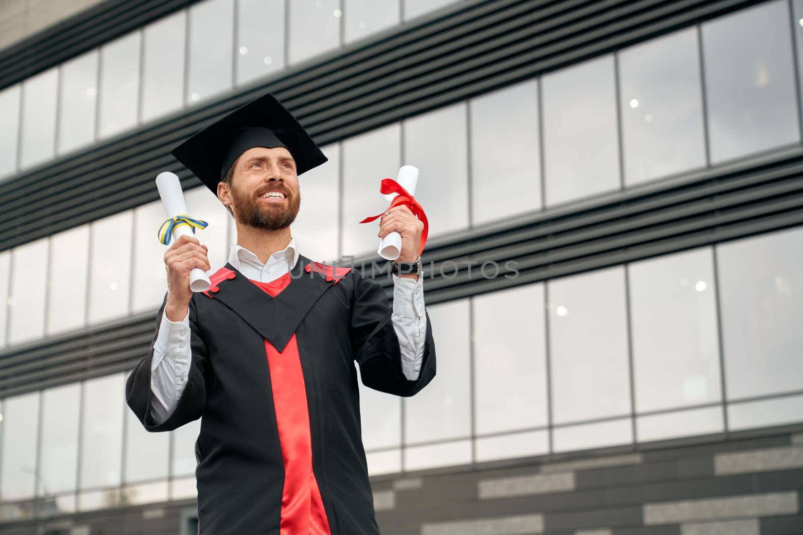 Master graduating from college, university, high school. by SerhiiBobyk