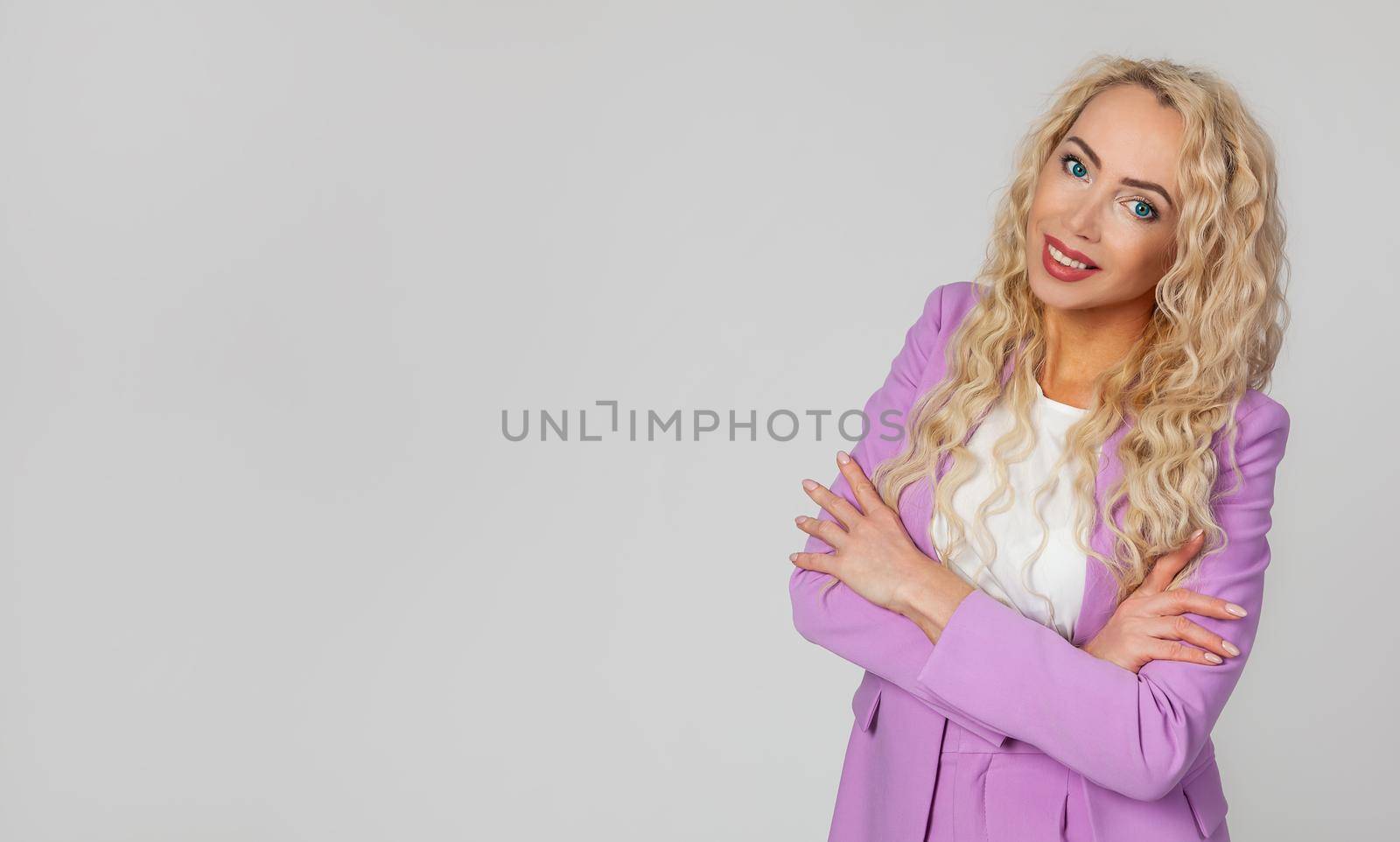 Beauty does not care age. Attractive cheerful middle aged blond woman laughing joyfully feel happiness positive emotions giggle funny entertaining conversation, arms crossed chest relaxed.