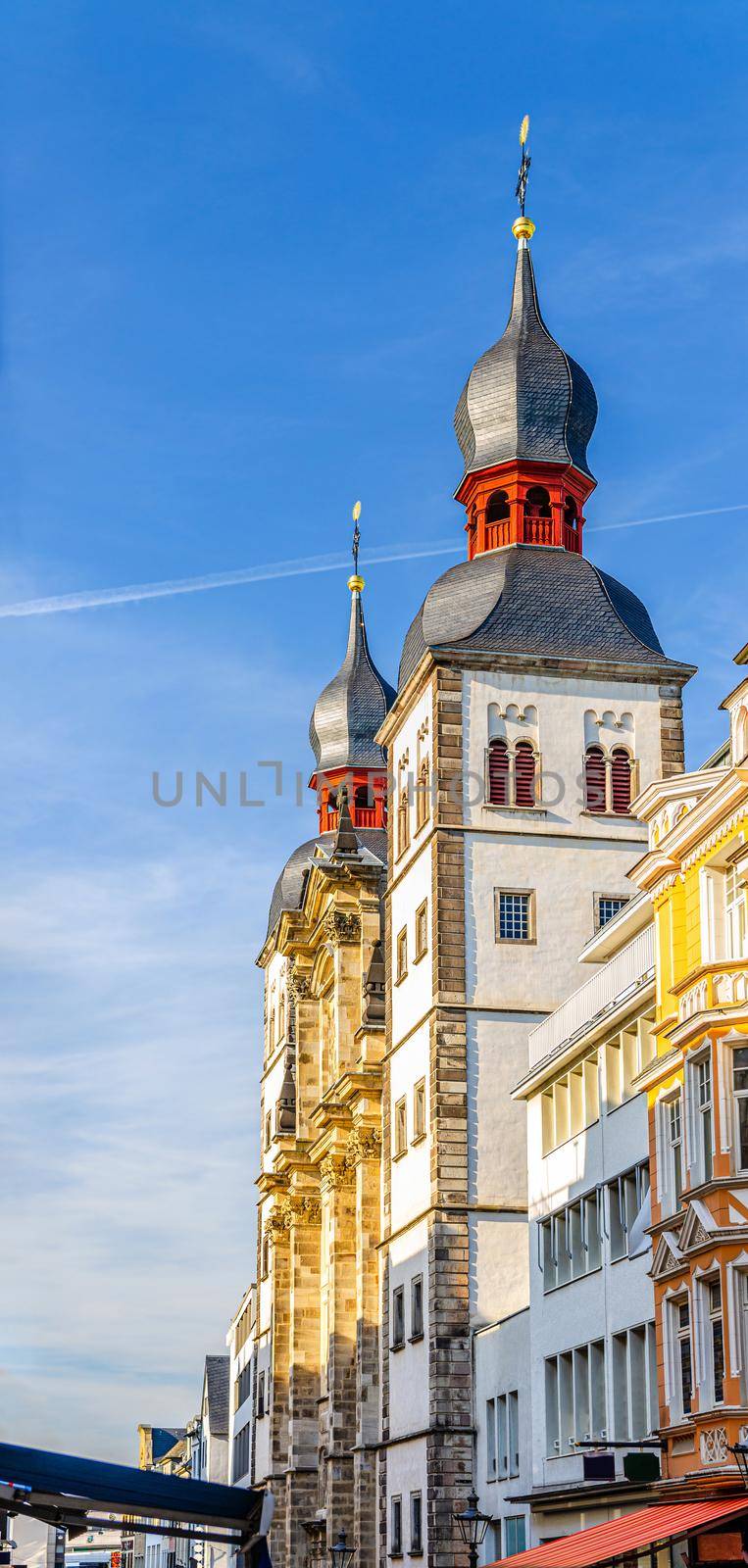 Holy Name Church catholic building in Bonn historical city centre, blue sky background, vertical view, North Rhine-Westphalia region, Germany