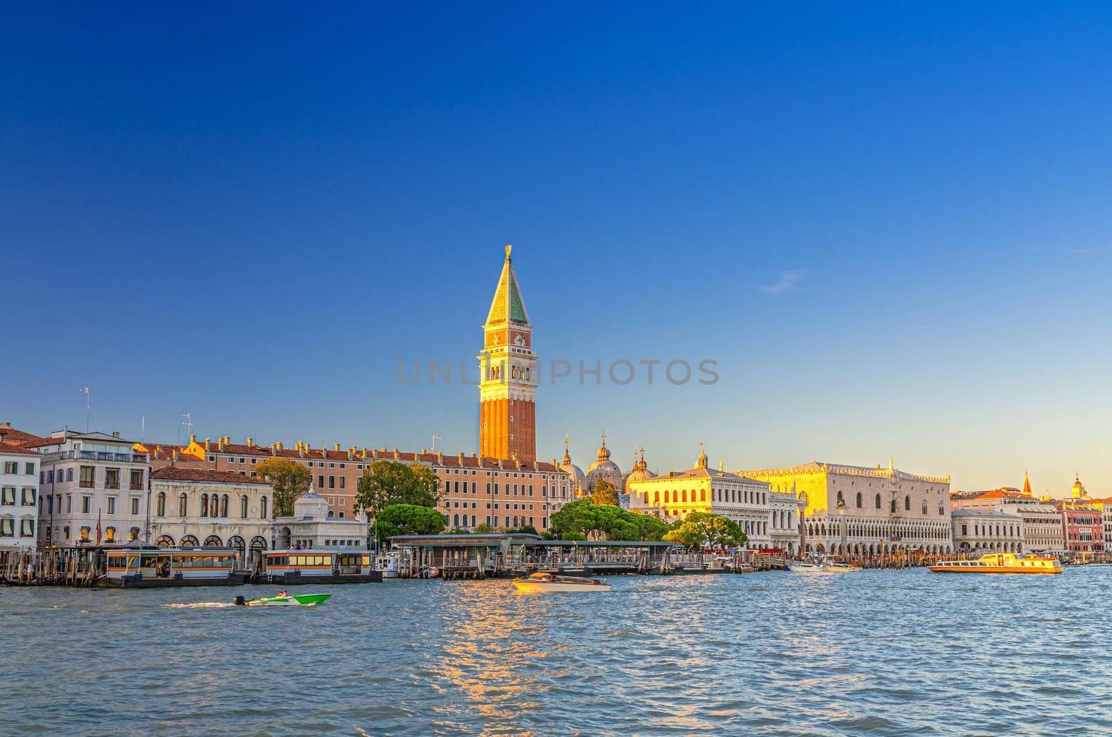 Venice cityscape with San Marco basin of Venetian lagoon water, Procuratie Vecchie, Campanile bell tower, Biblioteca Marciana Library and Doge's Palace Palazzo Ducale building, Veneto Region, Italy