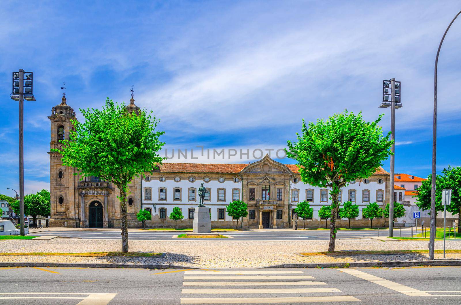 Igreja do Populo catholic church neoclassical building and Convento do Populo monastery in Braga city historical centre, blue sky white clouds background, Norte or Northern Portugal