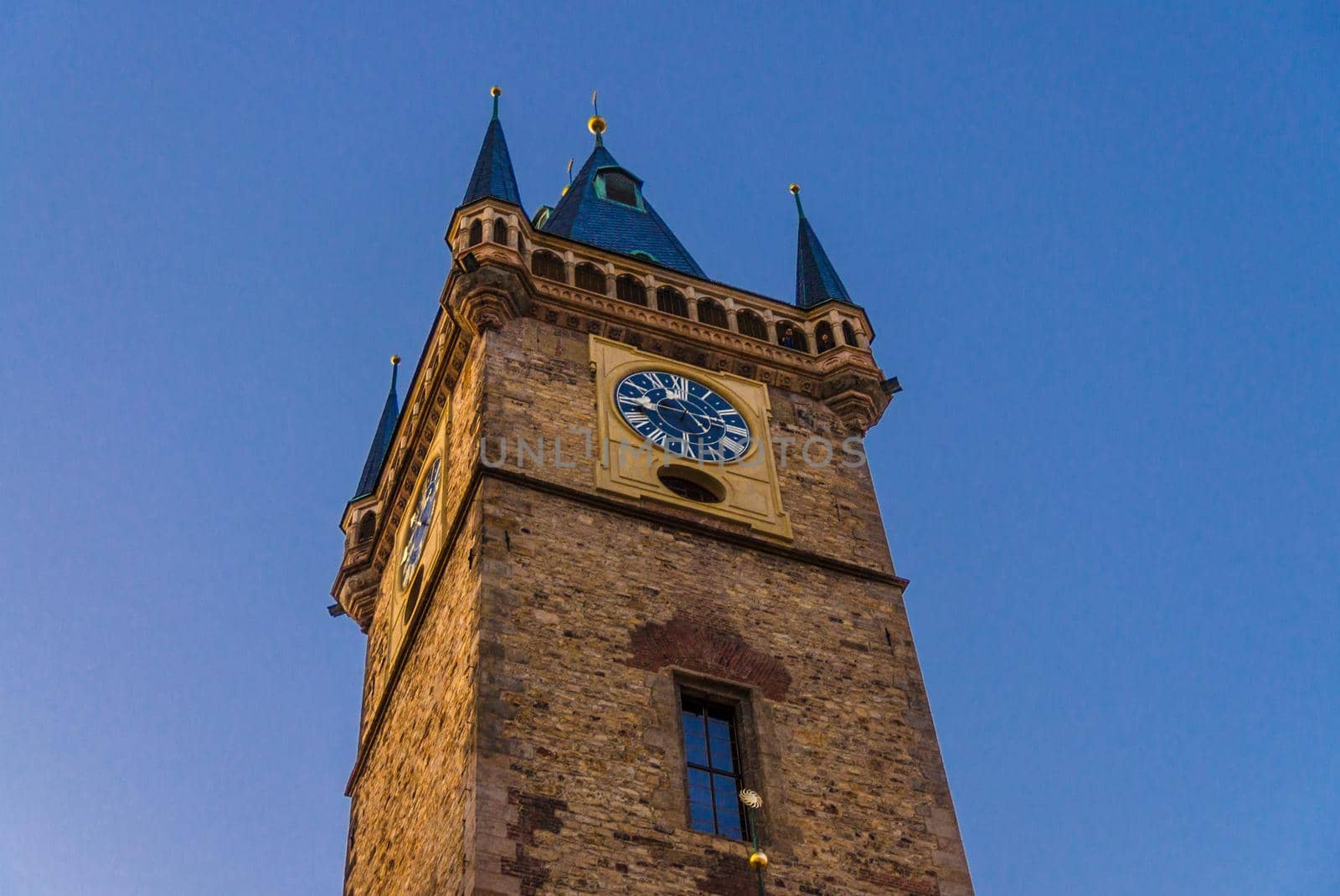 Clear blue sky of Prague, Main tower of the Old Town Hall, City Hall is made in Gothic Style, Prague chimes, observation deck of The Old Town Square Stare Mesto , Bohemia, Czech Republic