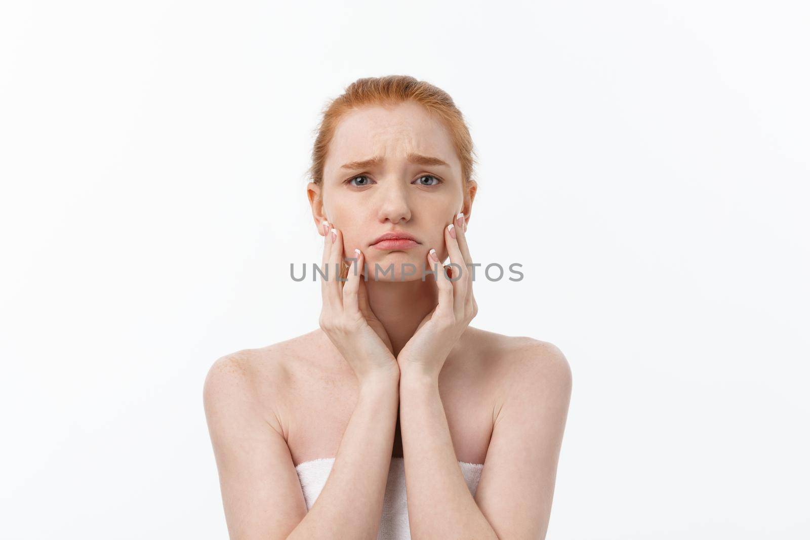 Portrait sad serious young woman with disappointed facial expression.. isolated on white background, looking at camera by Benzoix