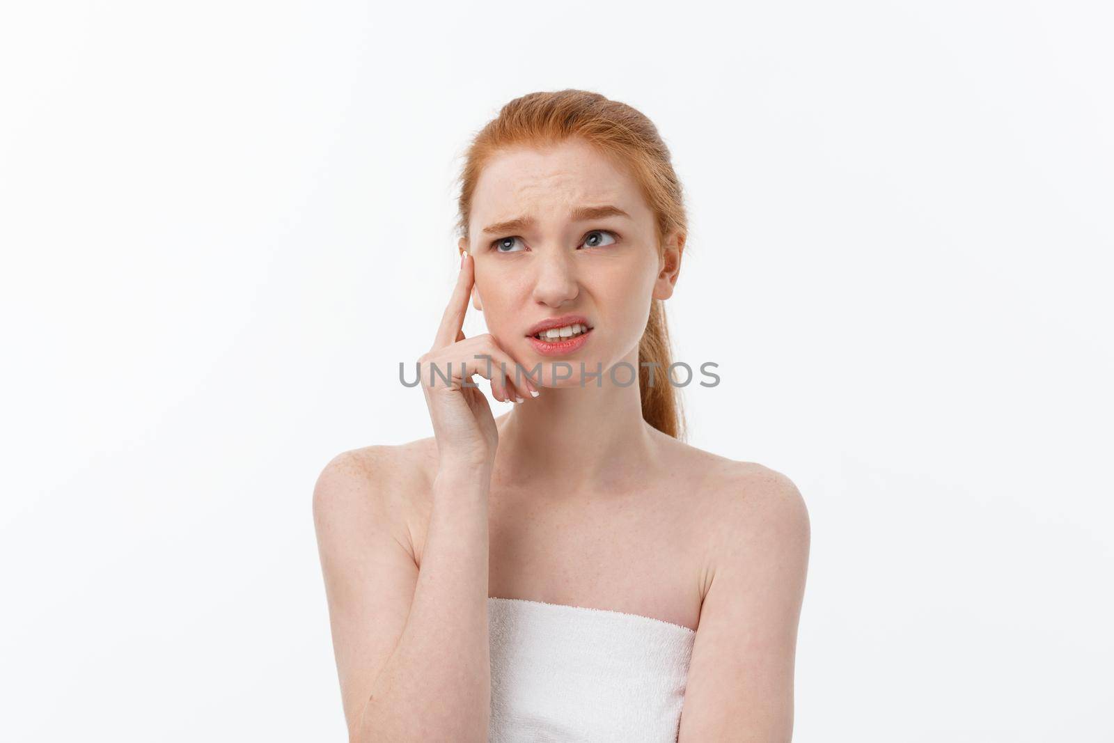 Portrait sad serious young woman with disappointed facial expression.. isolated on white background, looking at camera.