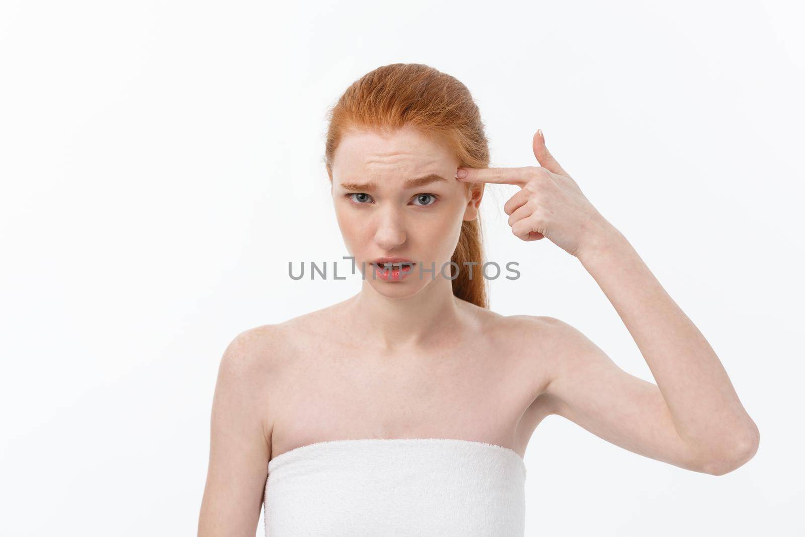 Portrait sad serious young woman with disappointed facial expression.. isolated on white background, looking at camera.