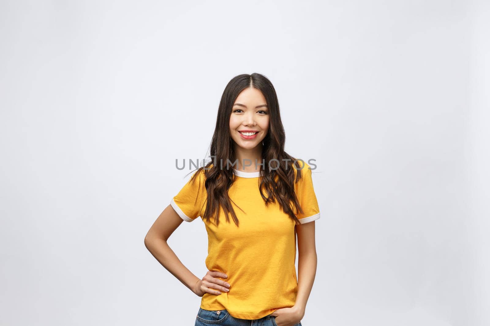 Happy young asian woman with blank copy space area for text or slogan,Closeup portrait of beautiful Asian woman,girl,Positive human emotion facial expression,isolated on white background.