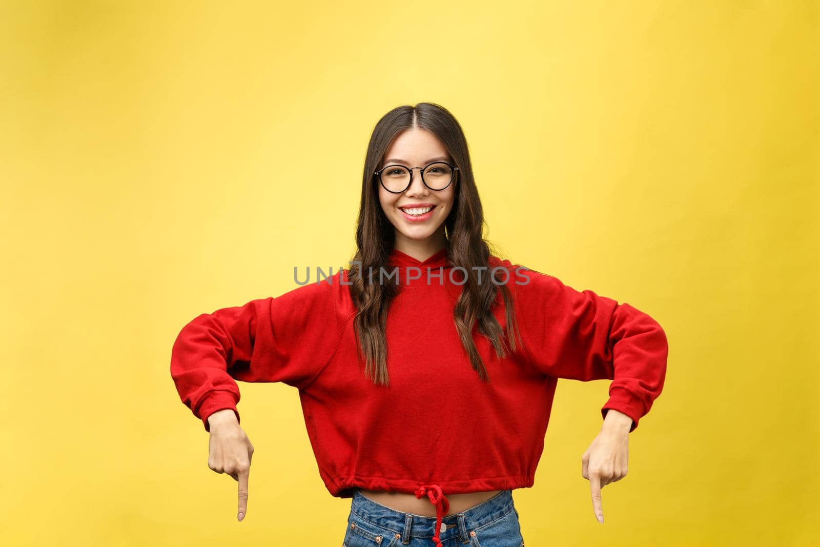 young attractive asian woman who points to the finger.