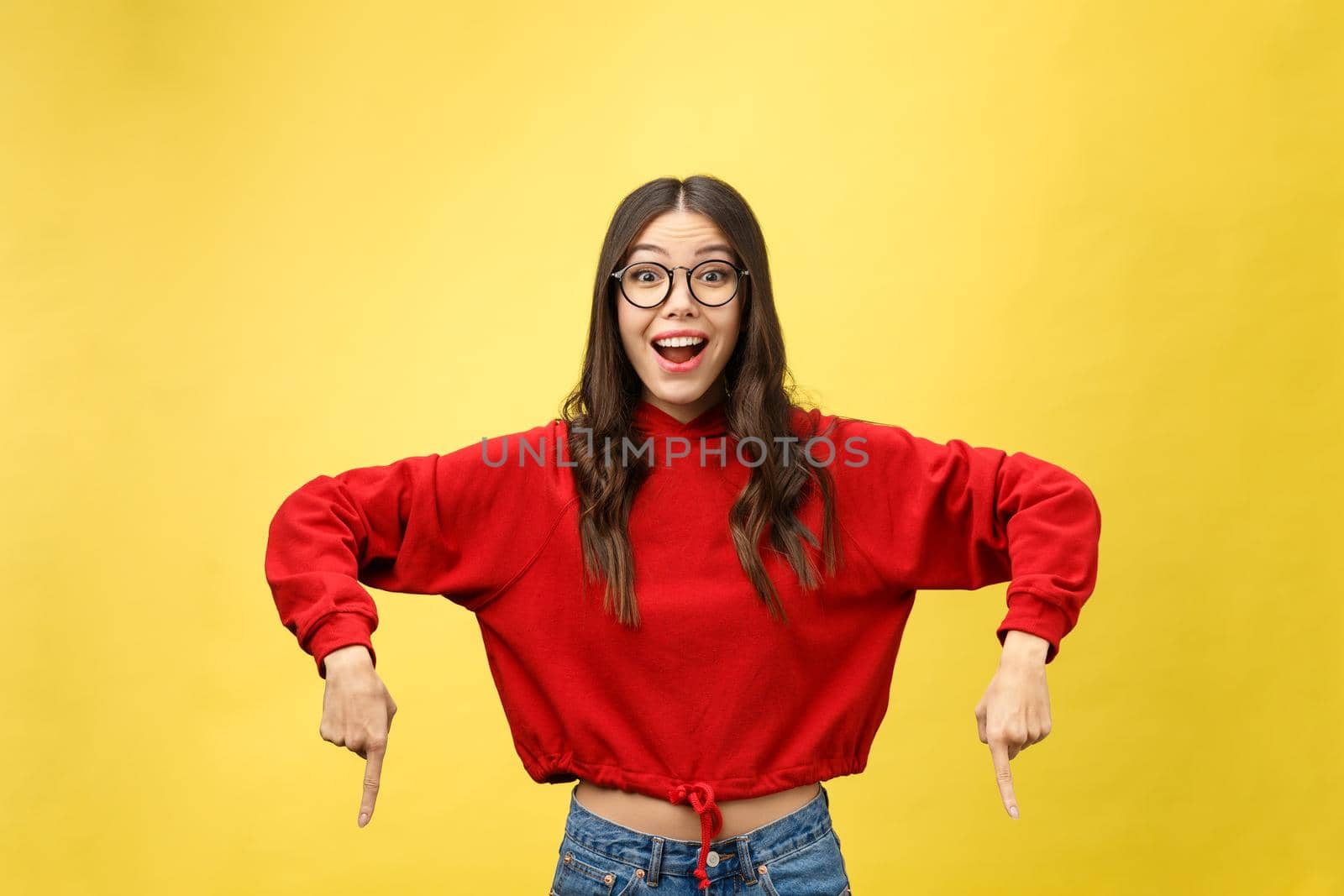 young attractive asian woman who points to the finger.