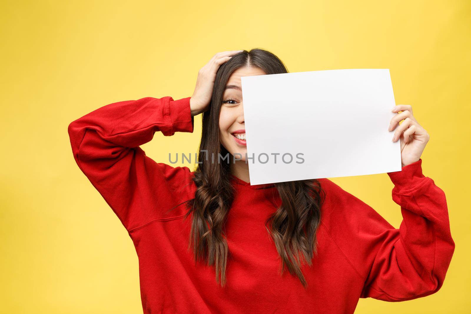 girl holds a white sheet in hands, an office worker shows a blank sheet