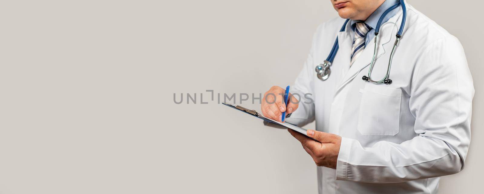 Doctor using a tablet and check with the analysis of the DNA chromosome of a genetic person on a virtual interface. Medicine. Medical science and biotechnology