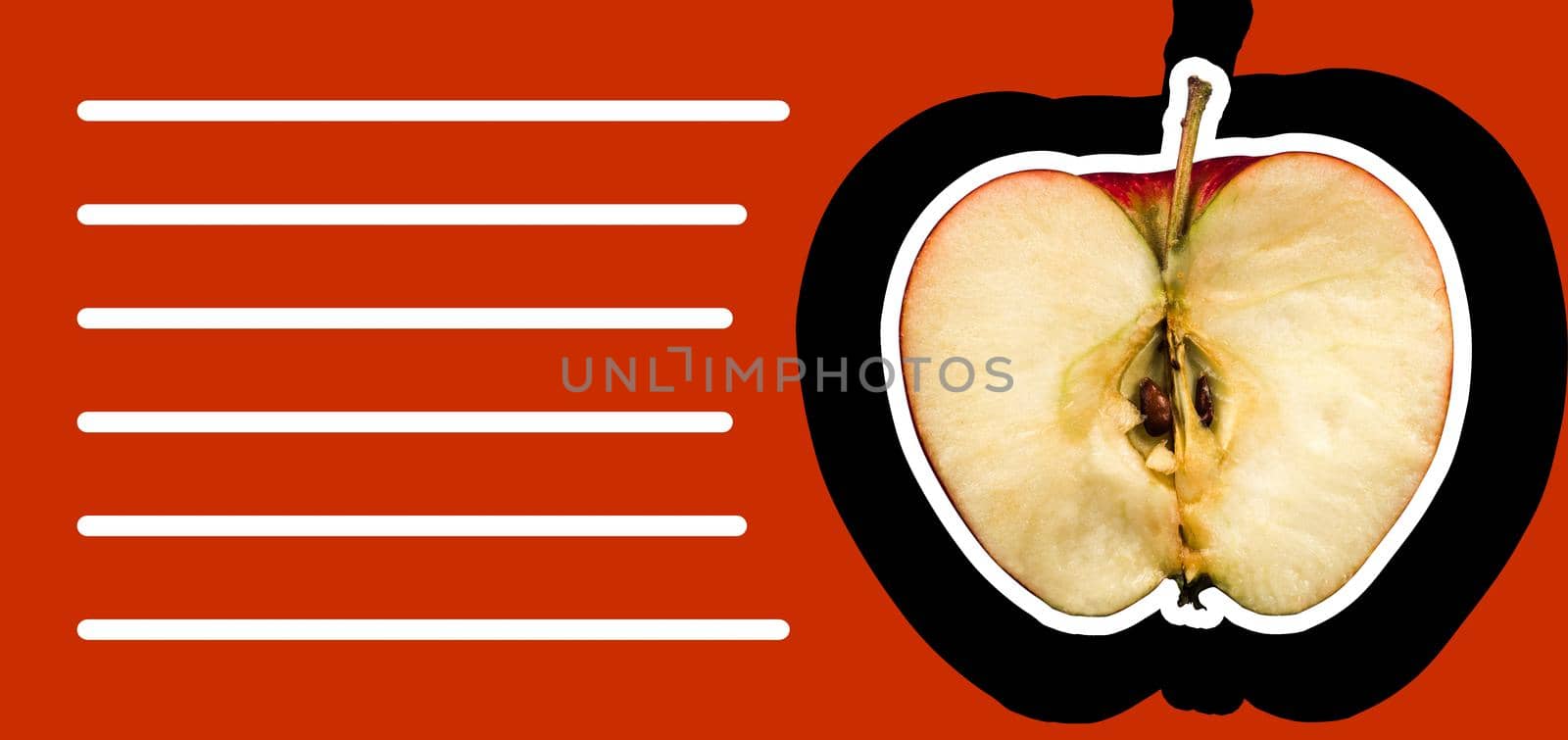 half a ripe apple, on a black background space for text on a red background