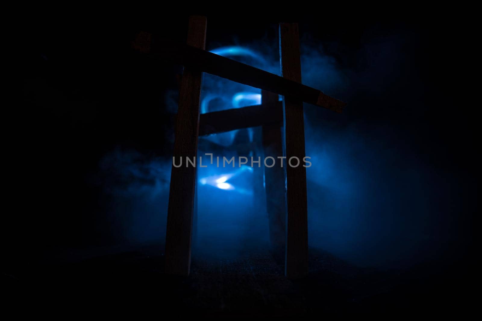 Creative artwork decoration. Abstract Japanese style wooden tunnel at night. Night scene in fantasy forest. Selective focus