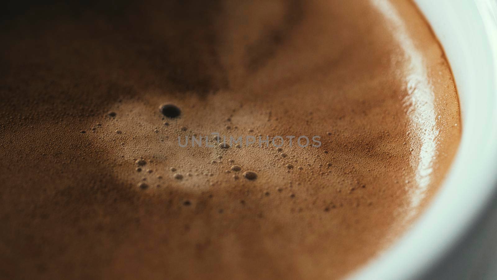 Close up Coffee froth on a hot coffee cup. Ready to drink hot cofffee