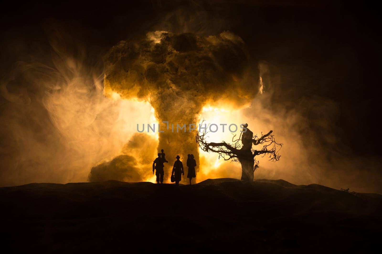 Creative artwork decoration - Russian war in Ukraine concept. Giant explosion of nuclear bomb and people. Selective focus