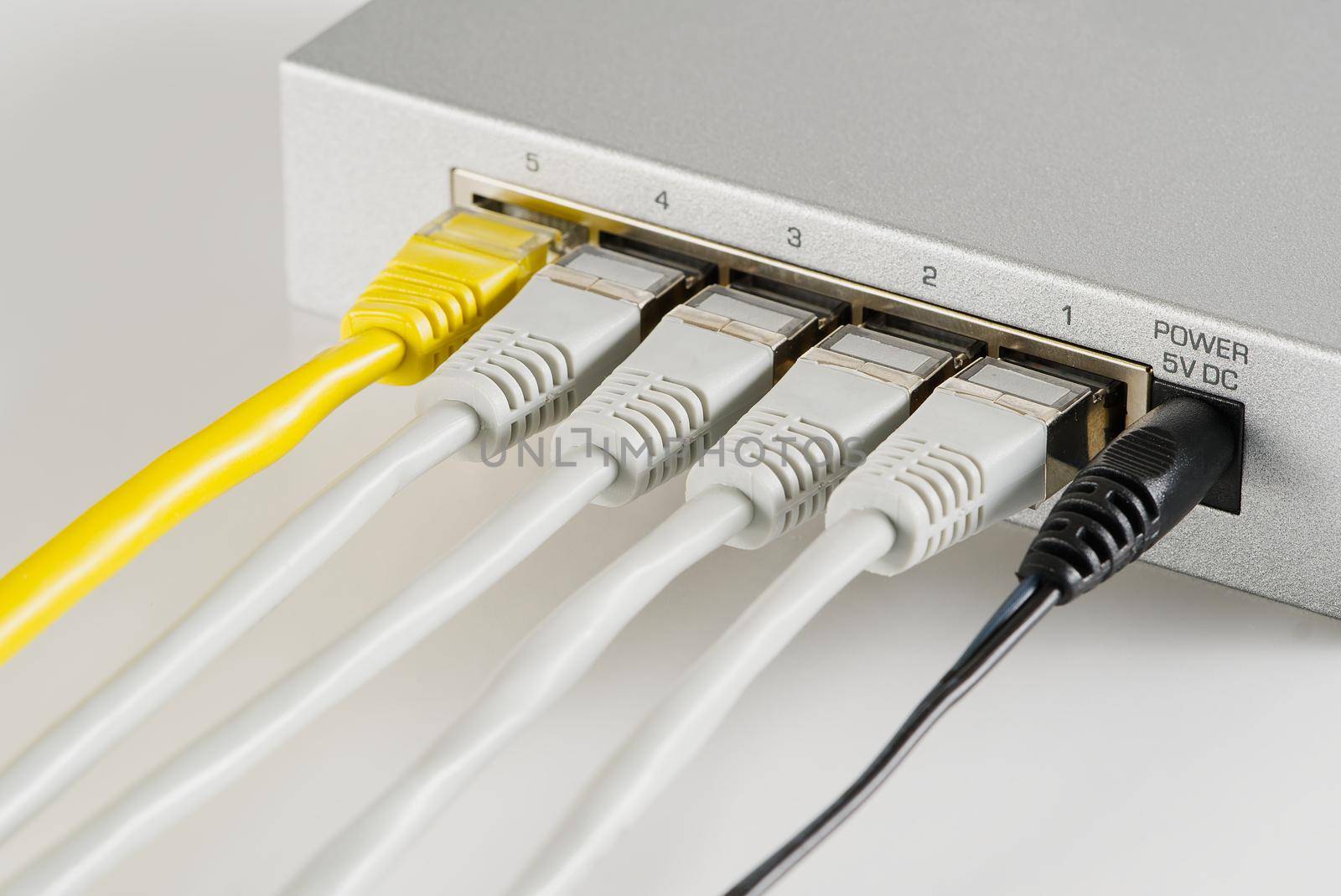 Small router and switch. tcp ip network business concept. High - performance gigabit switch. by PhotoTime