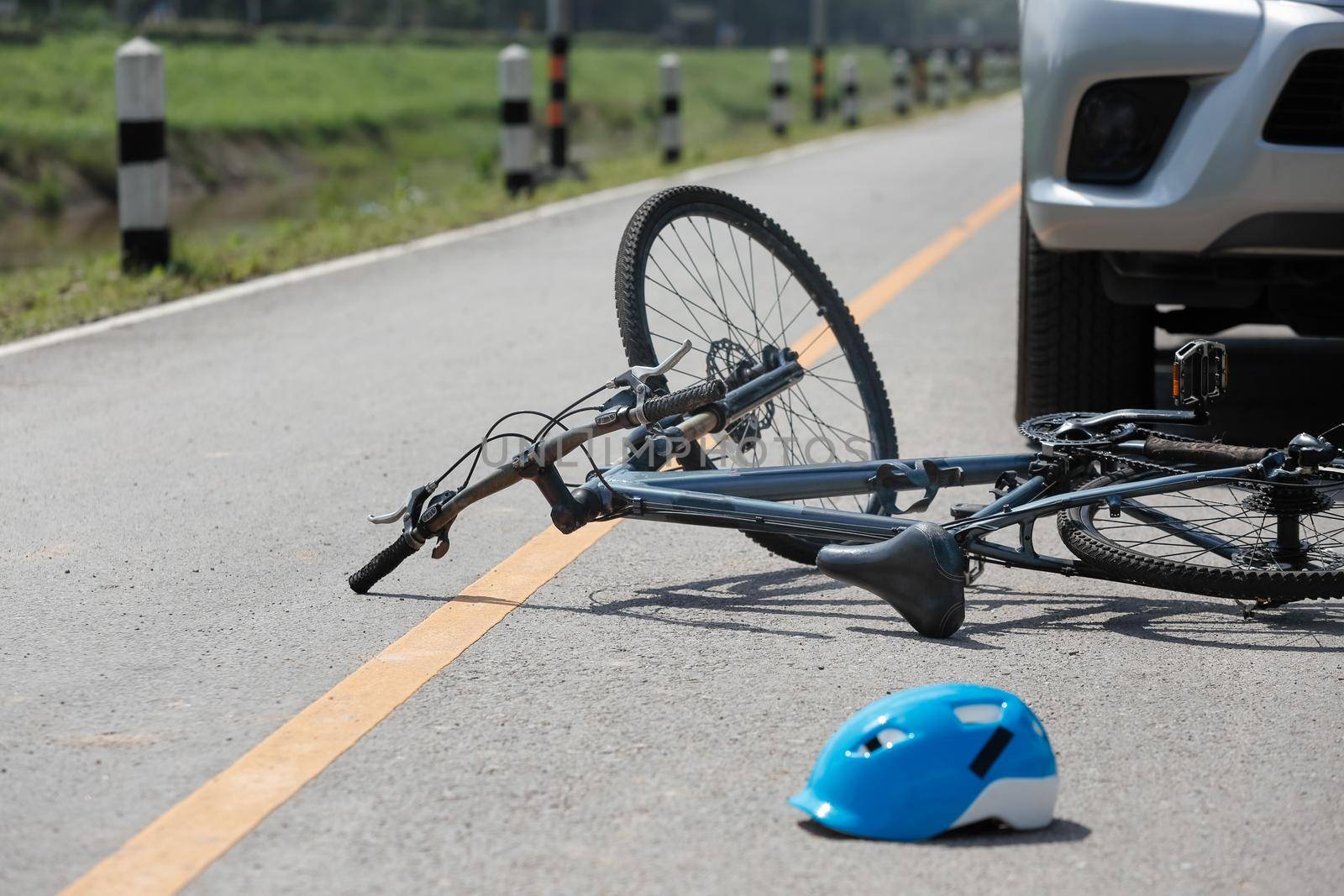 Accident car crash with bicycle on road