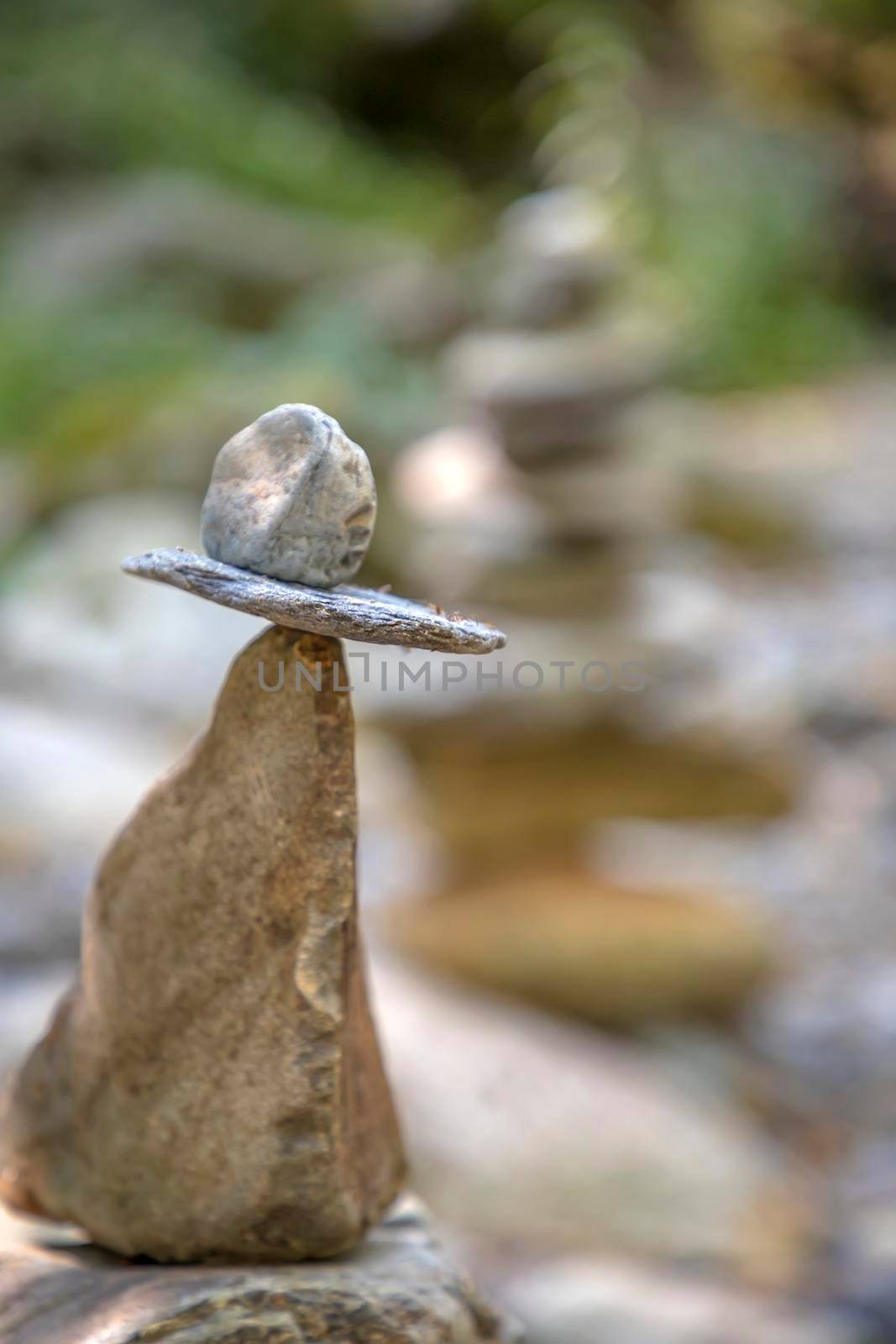 Beauty balancing pebbles from river stones stack. Tranquil Concept by EdVal