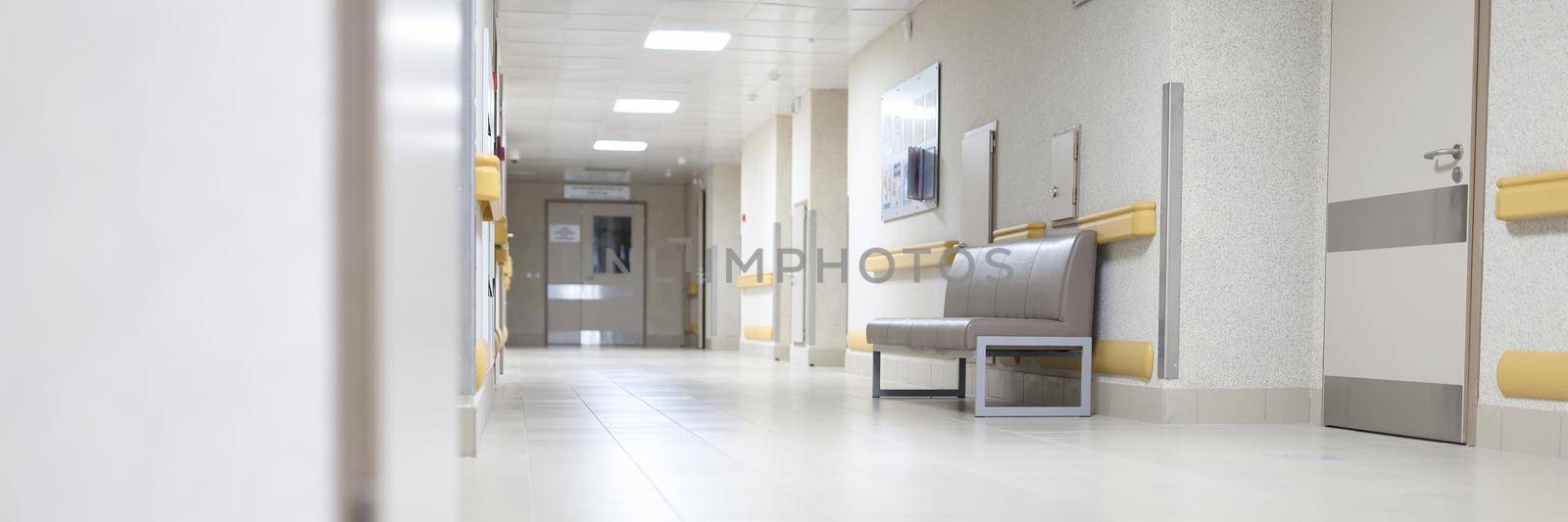 Empty hallway of a large building, hospital reception by kuprevich