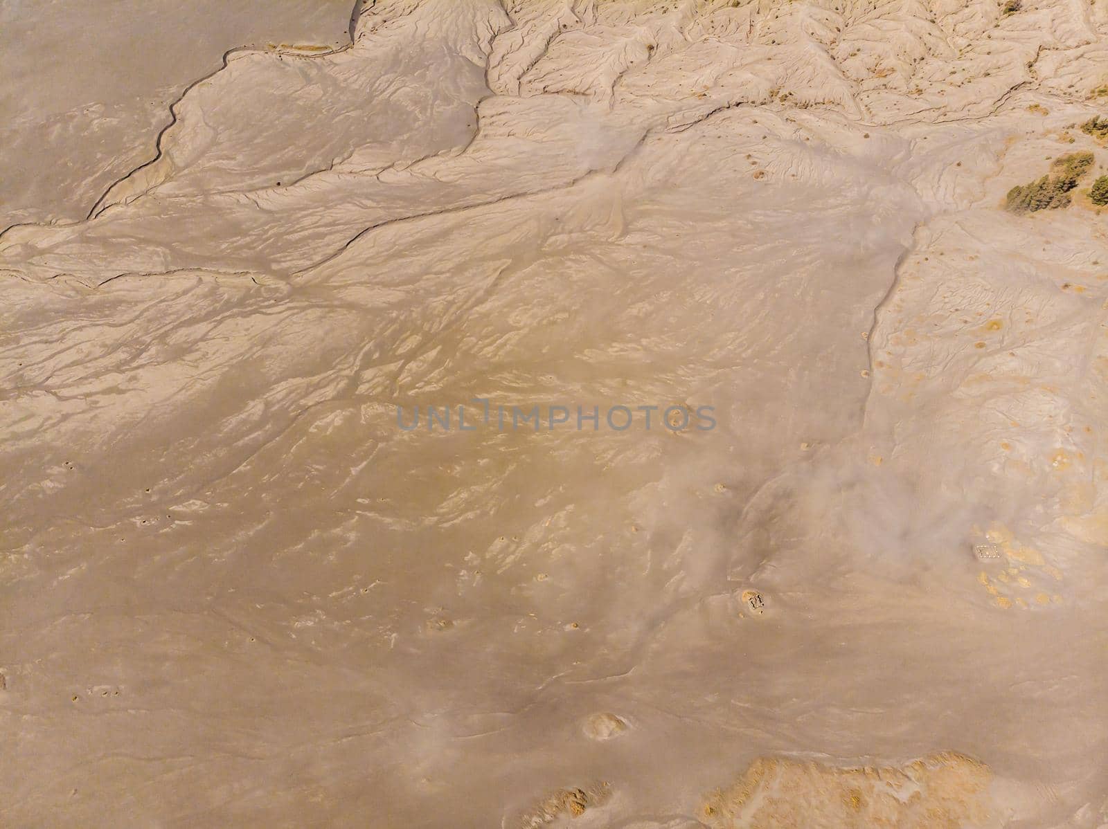Aerial shot of the Bromo volcano and Batok volcano at the Bromo Tengger Semeru National Park on Java Island, Indonesia. One of the most famous volcanic objects in the world. Travel to Indonesia concept.