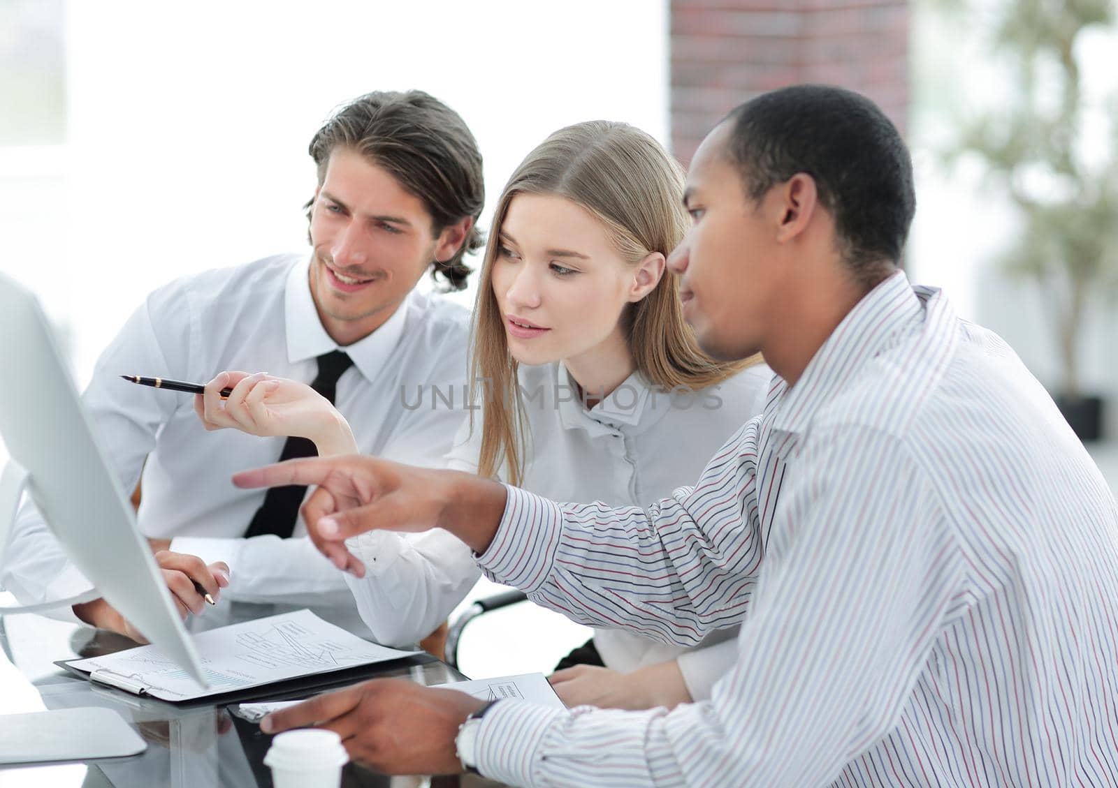 business team discussing information from the Internet.photo with copy space