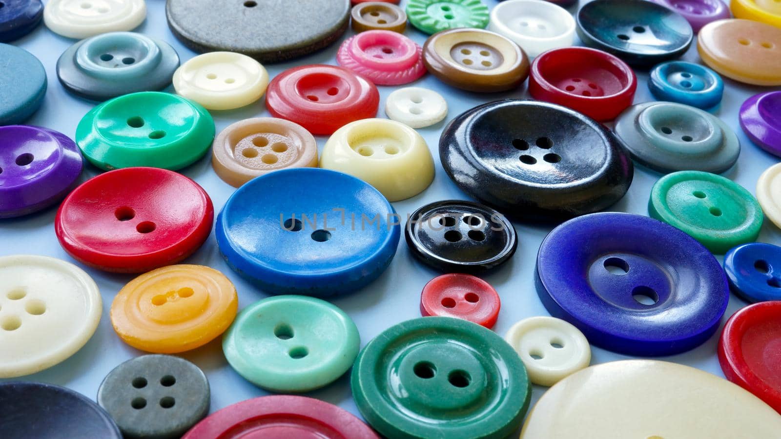 Background of different multicolored buttons. Diversity concept. by designer491