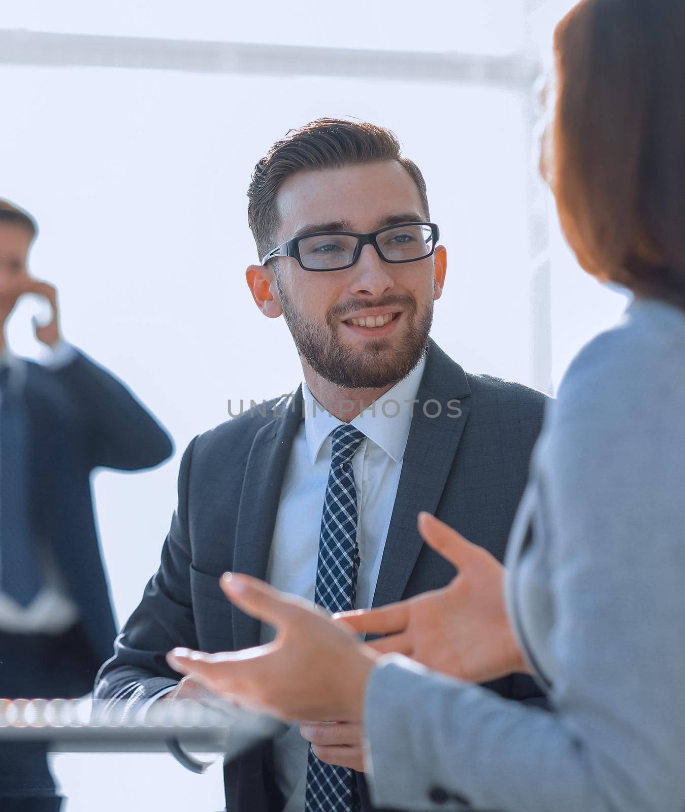 Confident man talking to his interviewer during a job interview.business concept