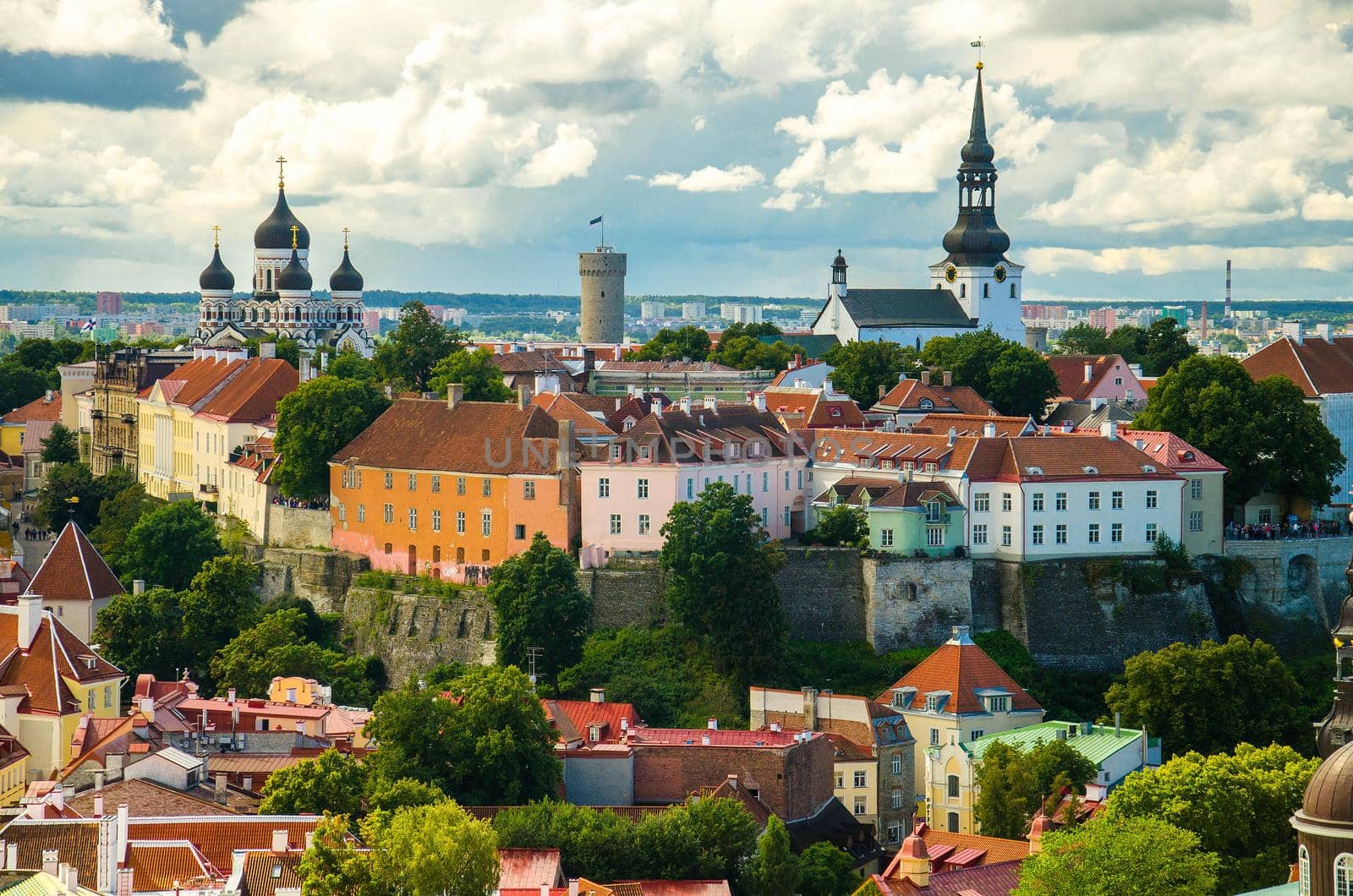 Panoramic view of Old Town of Tallinn with traditional red tile roofs, medieval churches, towers and walls, Toompea Hill from St. Olaf's Church Tower, Estonia