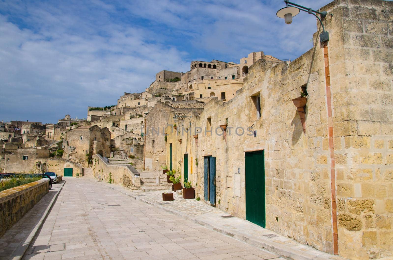 Stone streets and buildings in Matera with view of historical centre Sasso Caveoso of old ancient town Sassi di Matera, European Culture Capital, UNESCO World Heritage Site, Basilicata, Southern Italy