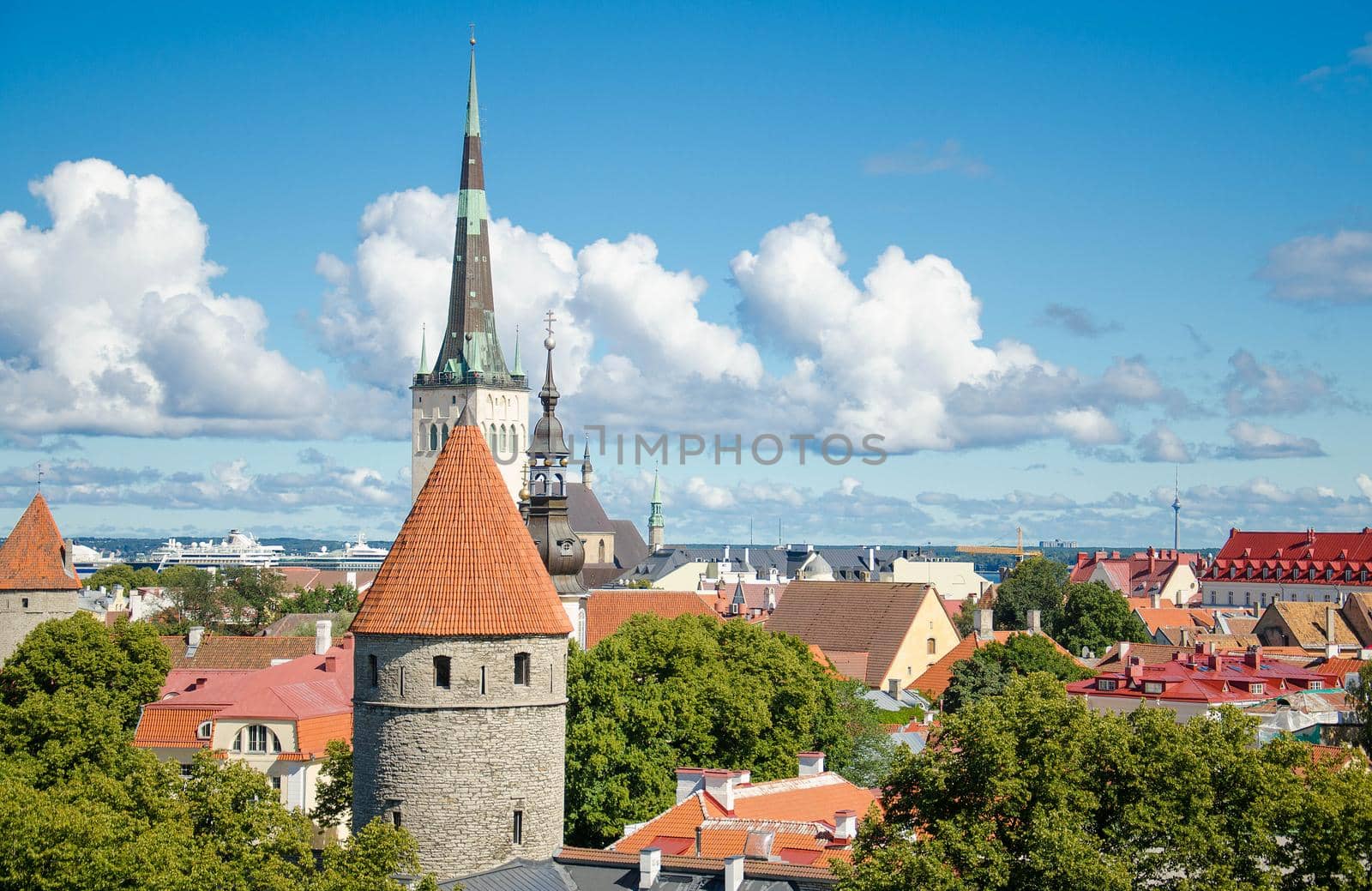 Panoramic view of Old Town of Tallinn with traditional red tile roofs, medieval churches, towers and walls, from Patkuli Vaateplatvorm Toompea Hill, Estonia