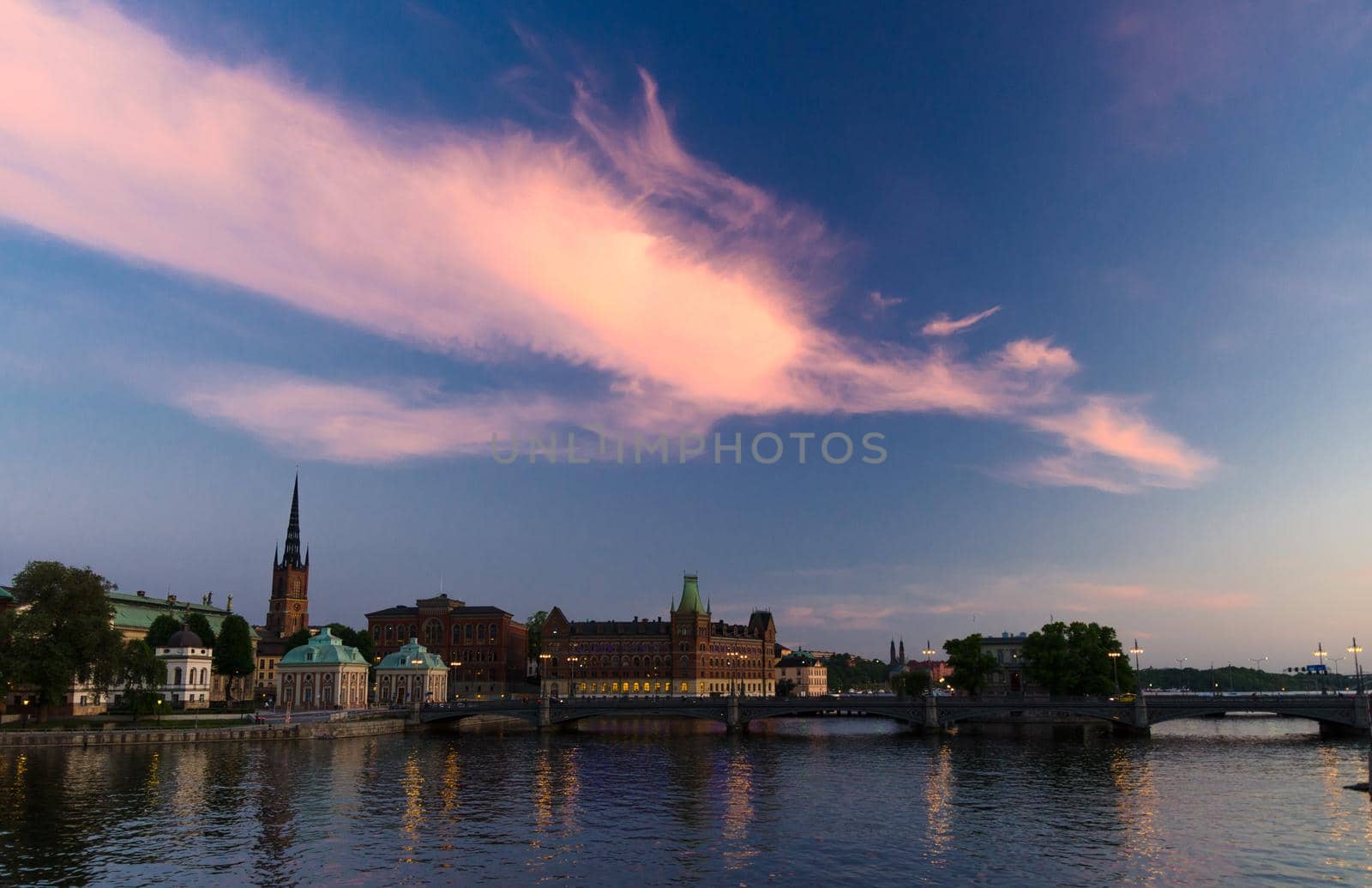 Scenic panoramic view of historical centre Riddarholmen with Riddarholm Church, Norstedts building, Vasabron bridge, The House of Nobility and Centralbron street, Gamla Stan, Stockholm, Sweden