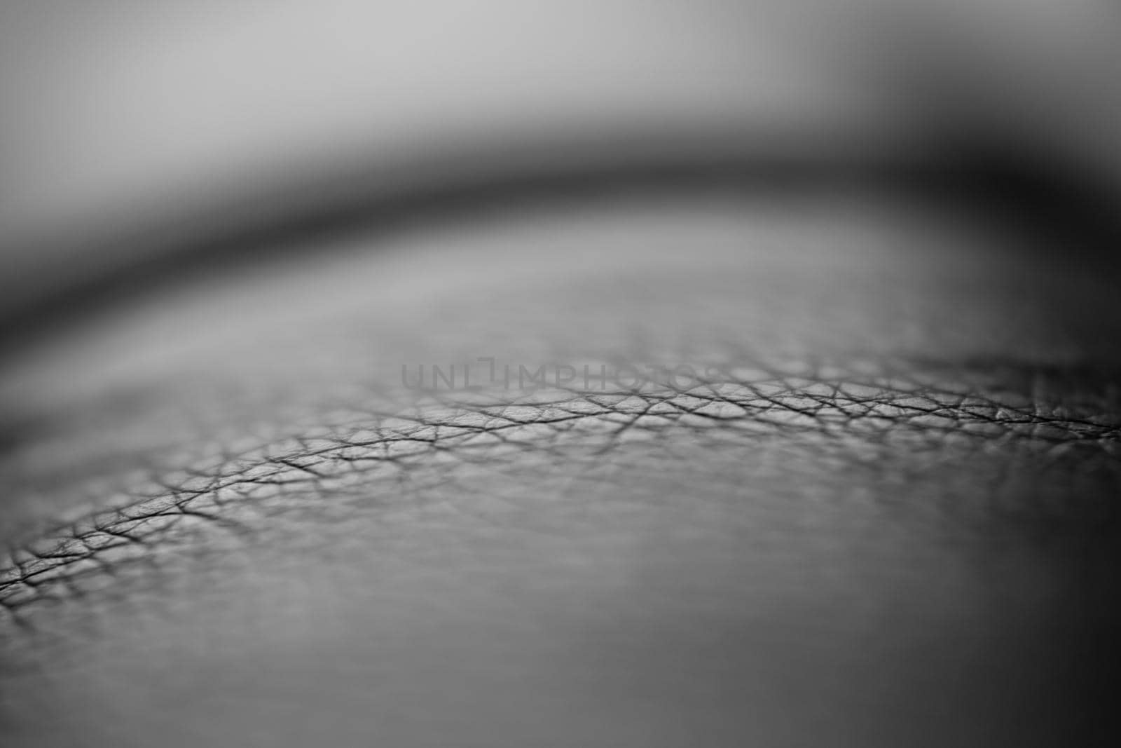 Structure of an artificial skin close-up. Selective focus. Background with gradient blur.