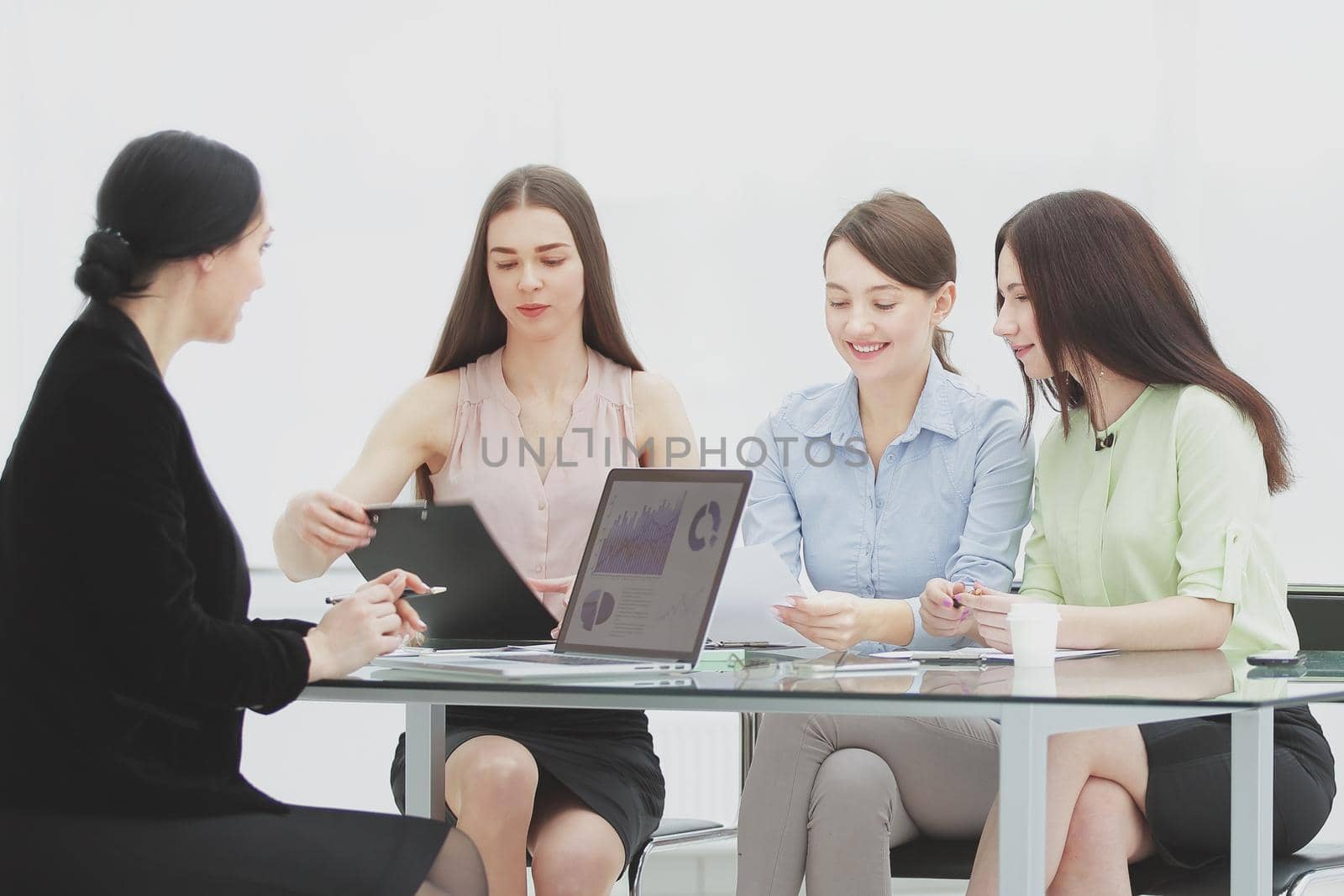 group of business woman at meeting in office.