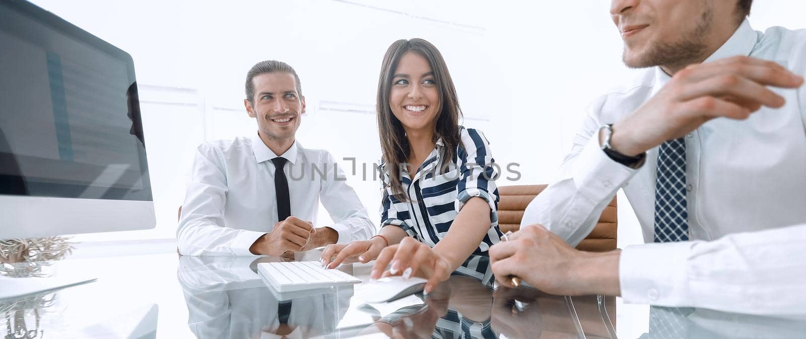 business team sitting at Desk by asdf