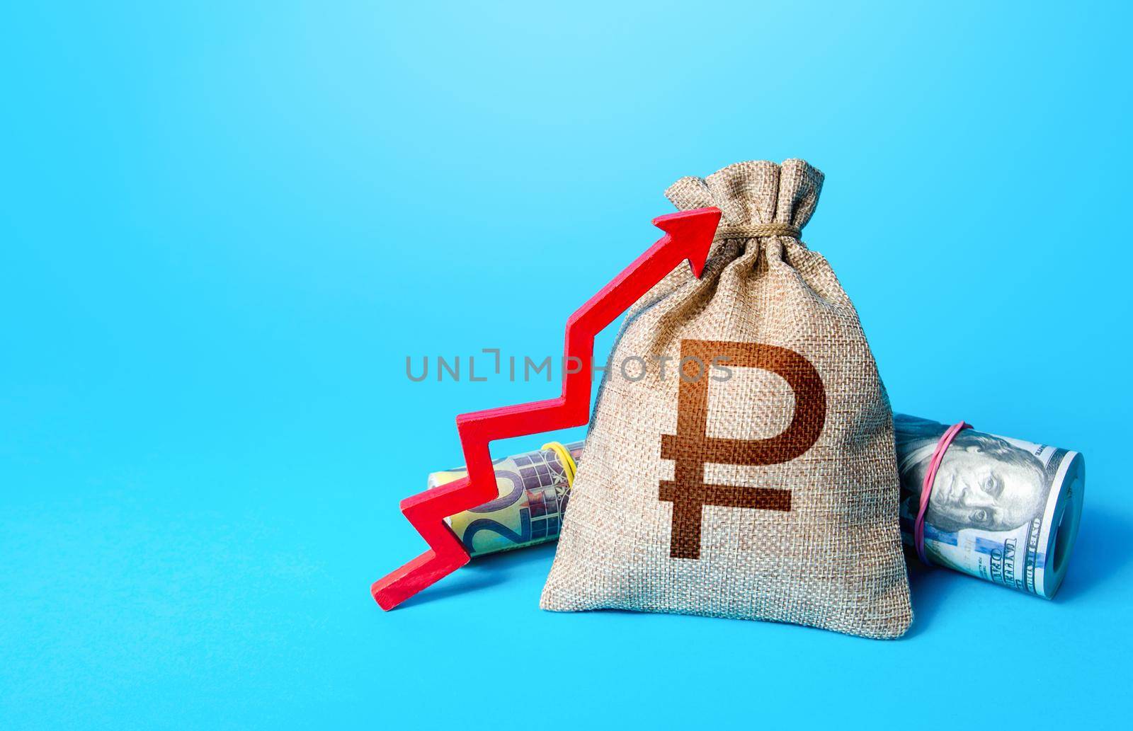 Russian ruble money bag and red up arrow. Economic growth, GDP. Increase in the deposit rate. Increase income and business efficiency. Inflation acceleration. Investments. Rise in profits, budget fees