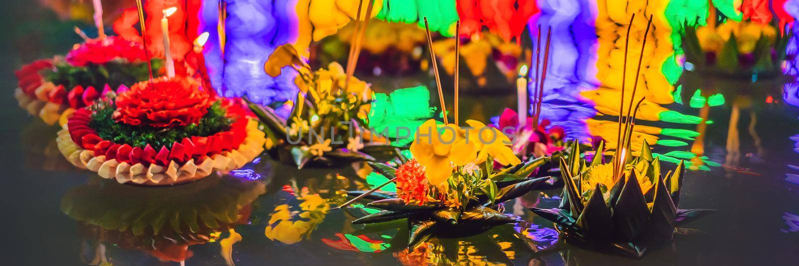 Loy Krathong festival, People buy flowers and candle to light and float on water to celebrate the Loy Krathong festival in Thailand BANNER, LONG FORMAT by galitskaya