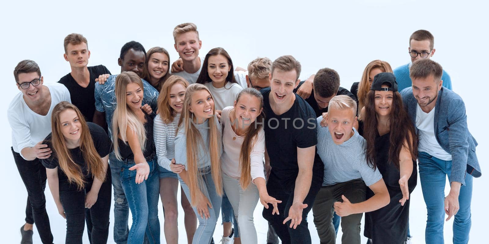 group of cheerful young people looking at the camera. by asdf