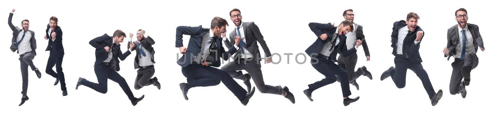 in full growth. two cheerful dancing business people. isolated on white background.