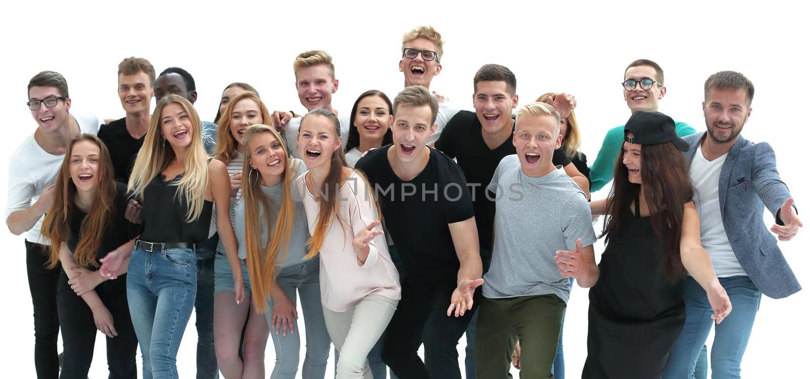 in full growth. group of cheerful young people standing together. isolated on white