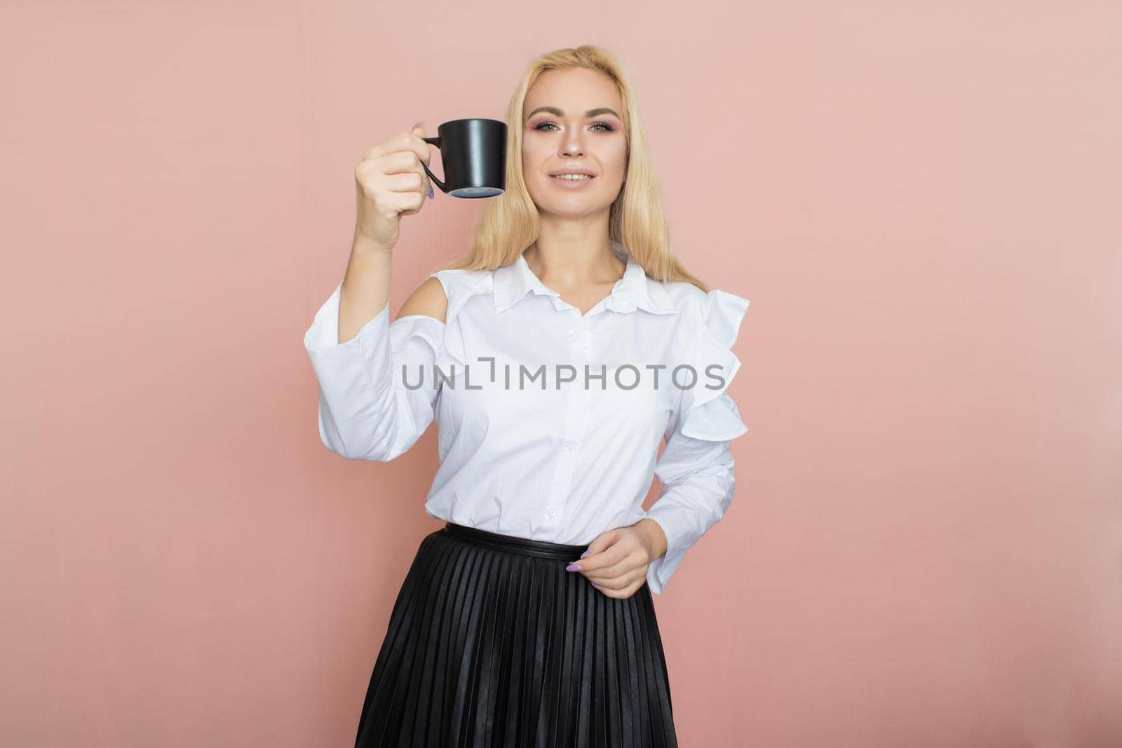 Office woman holding cup of tea or coffee by Bonda