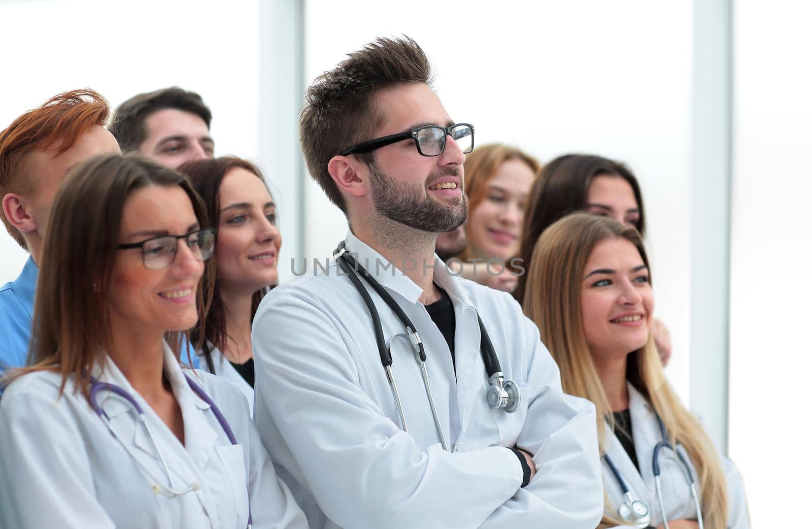 large group of doctors congratulating each other with applause . the concept of healthcare