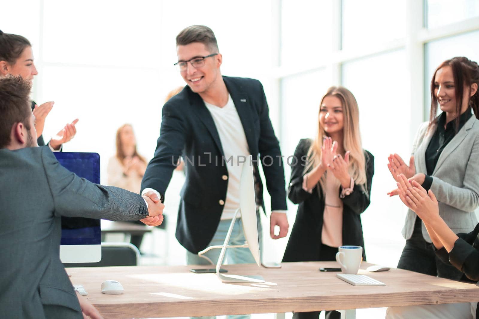 business people shake hands over an office Desk. concept of cooperation