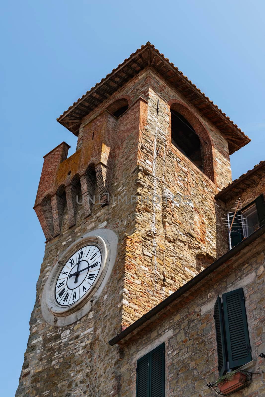 Old clock tower in Passignano sul Trasimeno ,Italy by victimewalker
