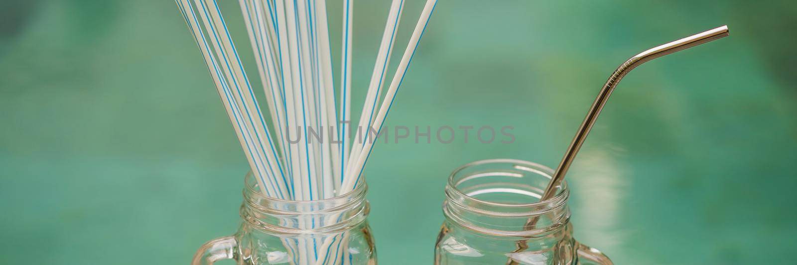 Steel drinking vs disposable straws on pool background. Zero waste concept BANNER, LONG FORMAT by galitskaya