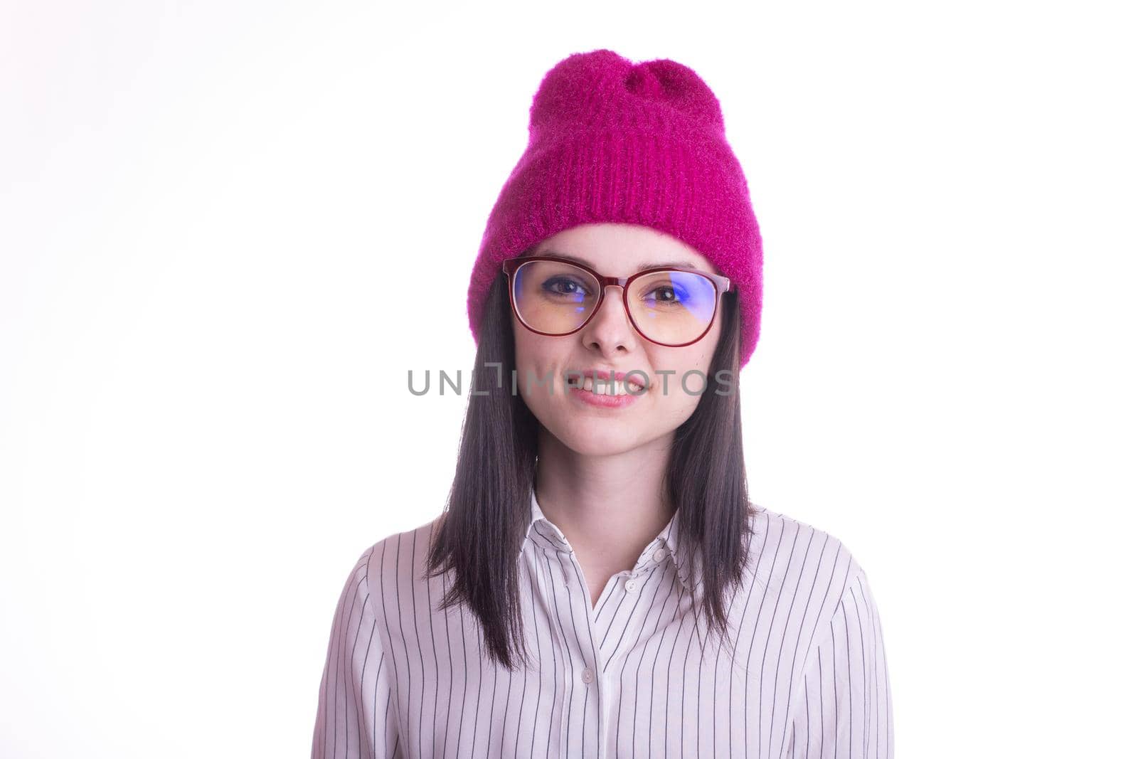 woman in shirt and pink hat, white background. High quality photo
