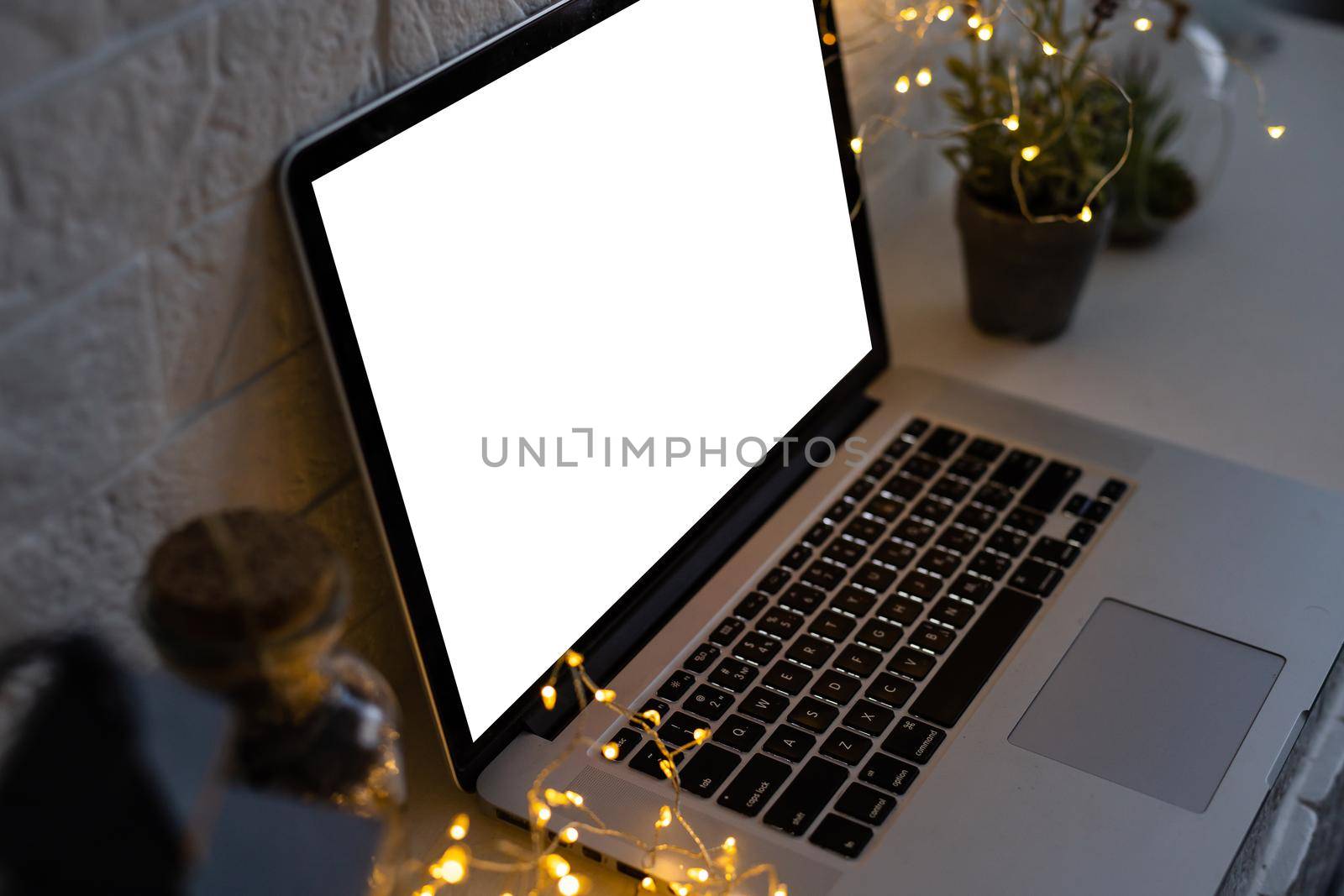 Laptop computer mockup white blank screen, Christmas. Xmas shopping online stores e commerce websites, virtual family party Happy New Year video calls.