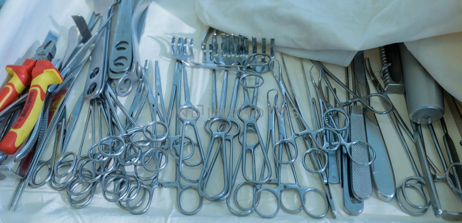 A set of surgical instruments during surgery.